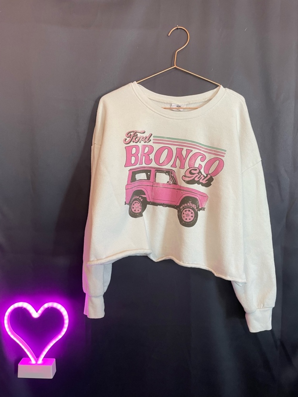 Women’s white Pullover Sweatshirt with Pink Bronco Graphic Ford cream bright